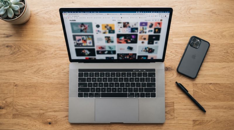 Multiple browser tabs open comparing different portfolio website options